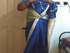 desi north indian horny cheating wife vanitha wearing blue colour saree showing big boobs and shaved pussy press